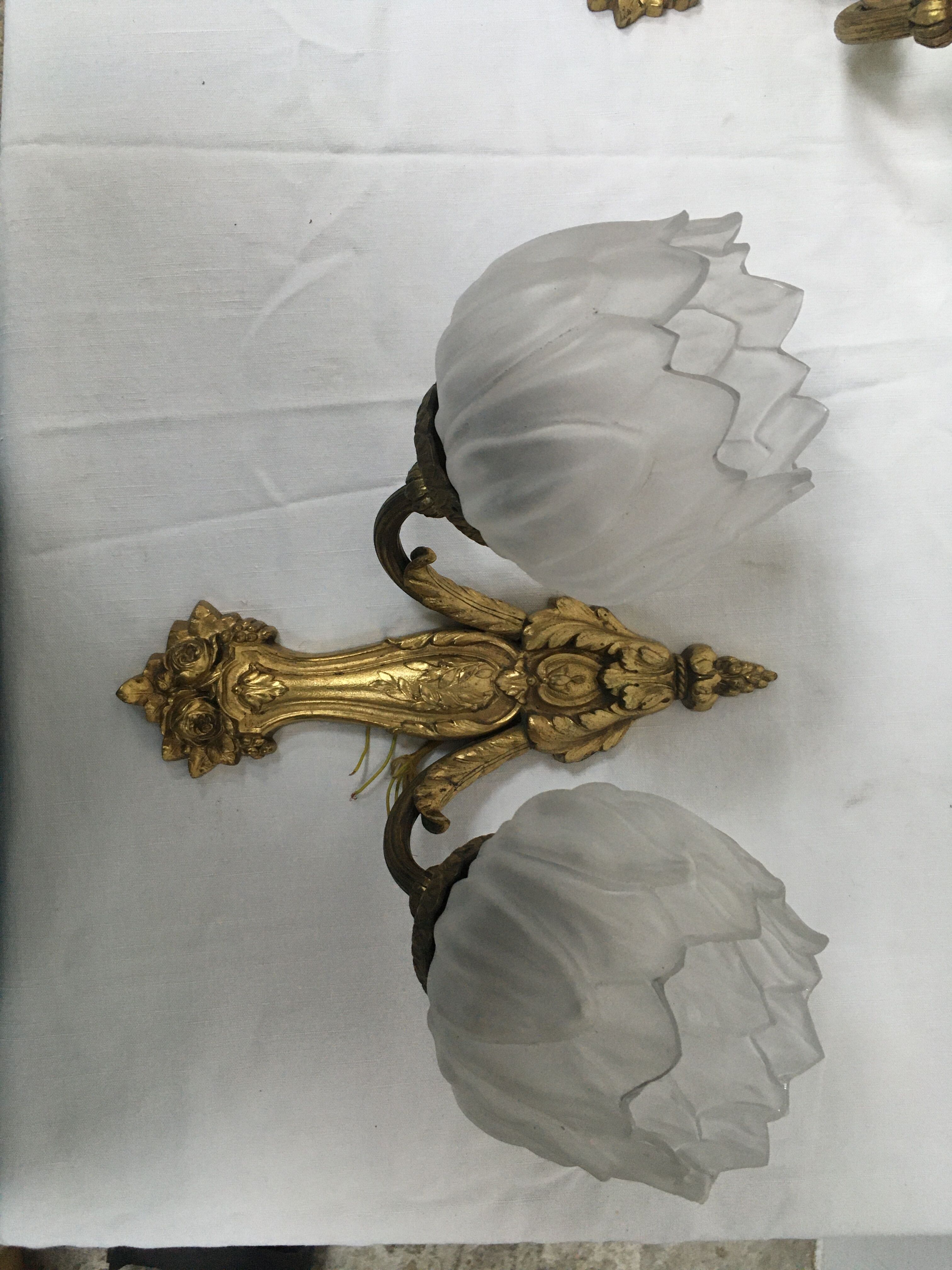 Pair of brass and glass wall light