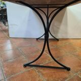 Wrought iron bistro table and fir top