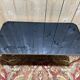 Neoclassical style coffee table with glass