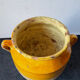 Old yellow glazed terracotta grease pot south west France