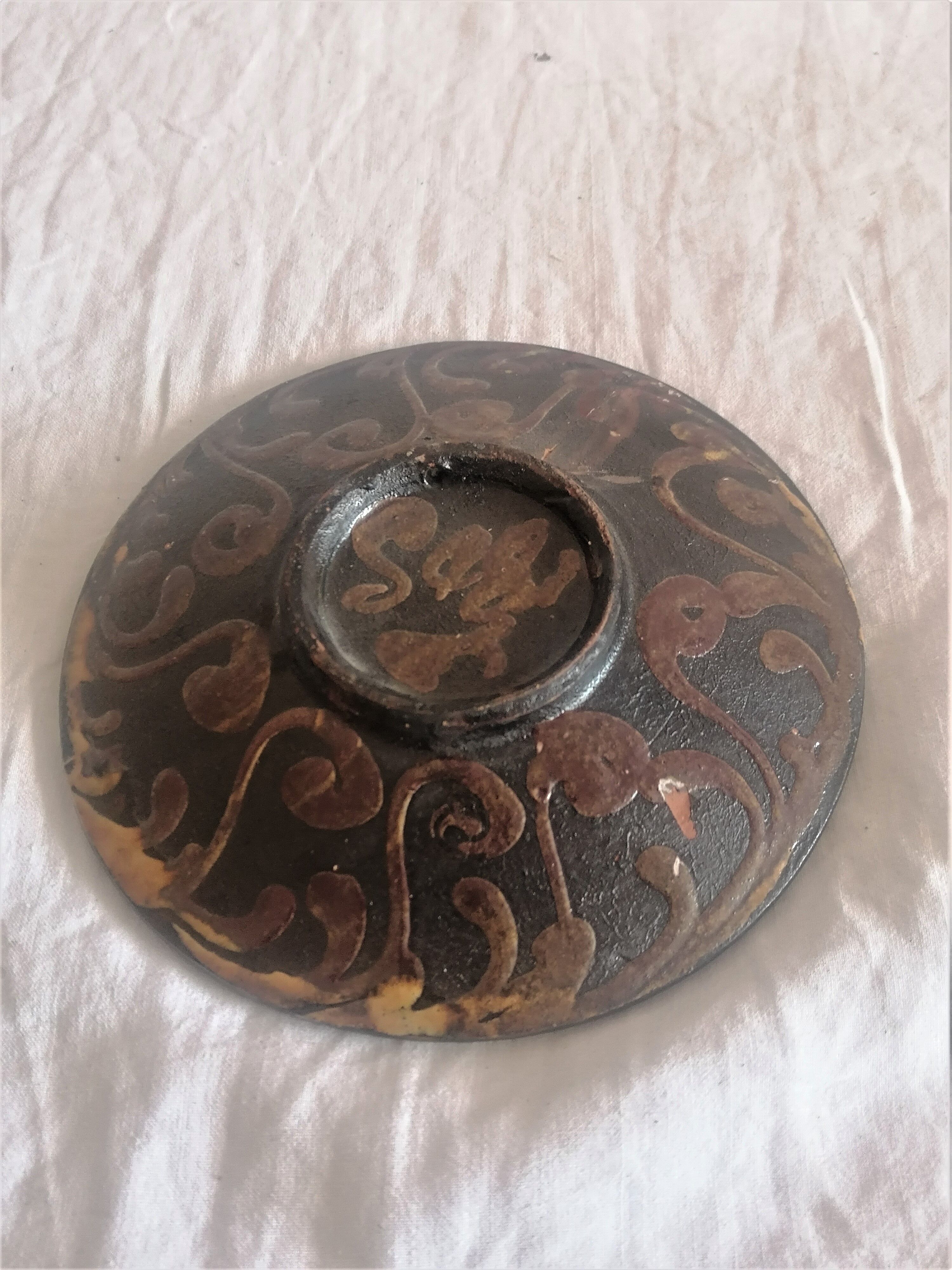 Old glazed terracotta plate. Safi. Year 69.