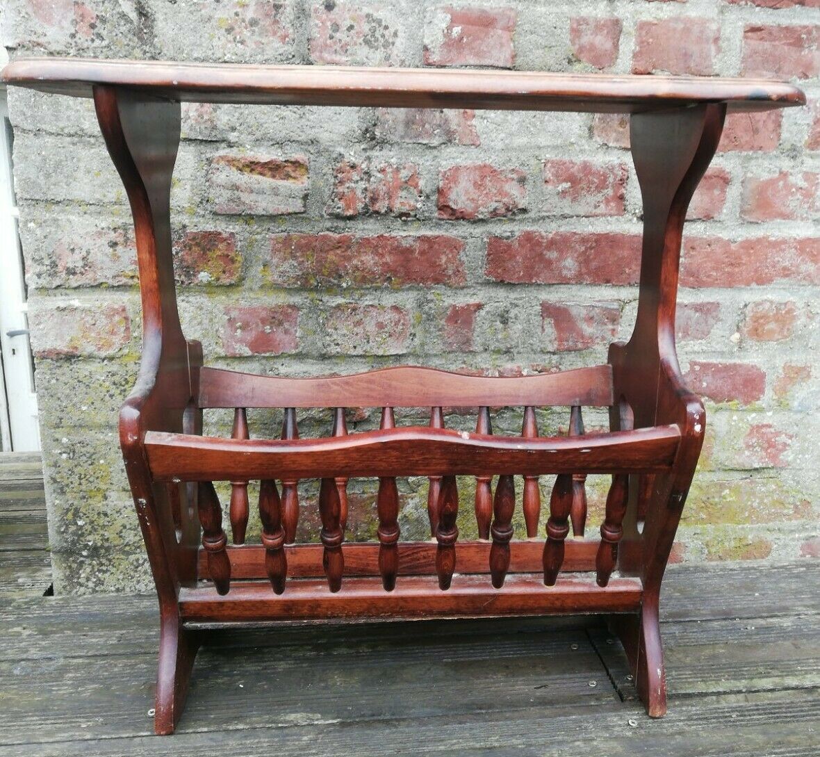 Wooden magazine holder with vintage tablet