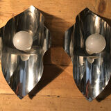 Pair space Age chrome metal wall appliques