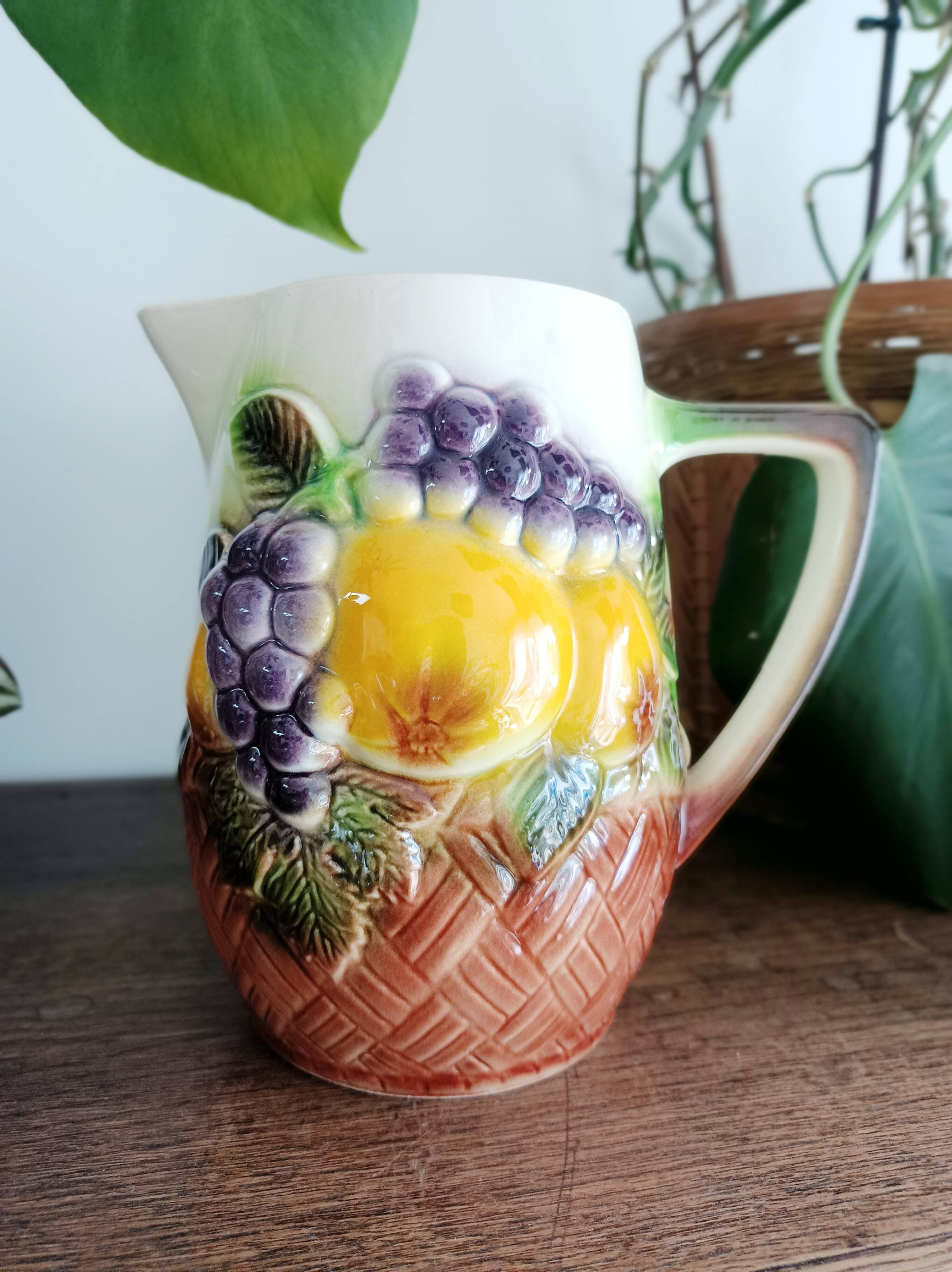 St-Clément pitcher in slip, fruit decoration