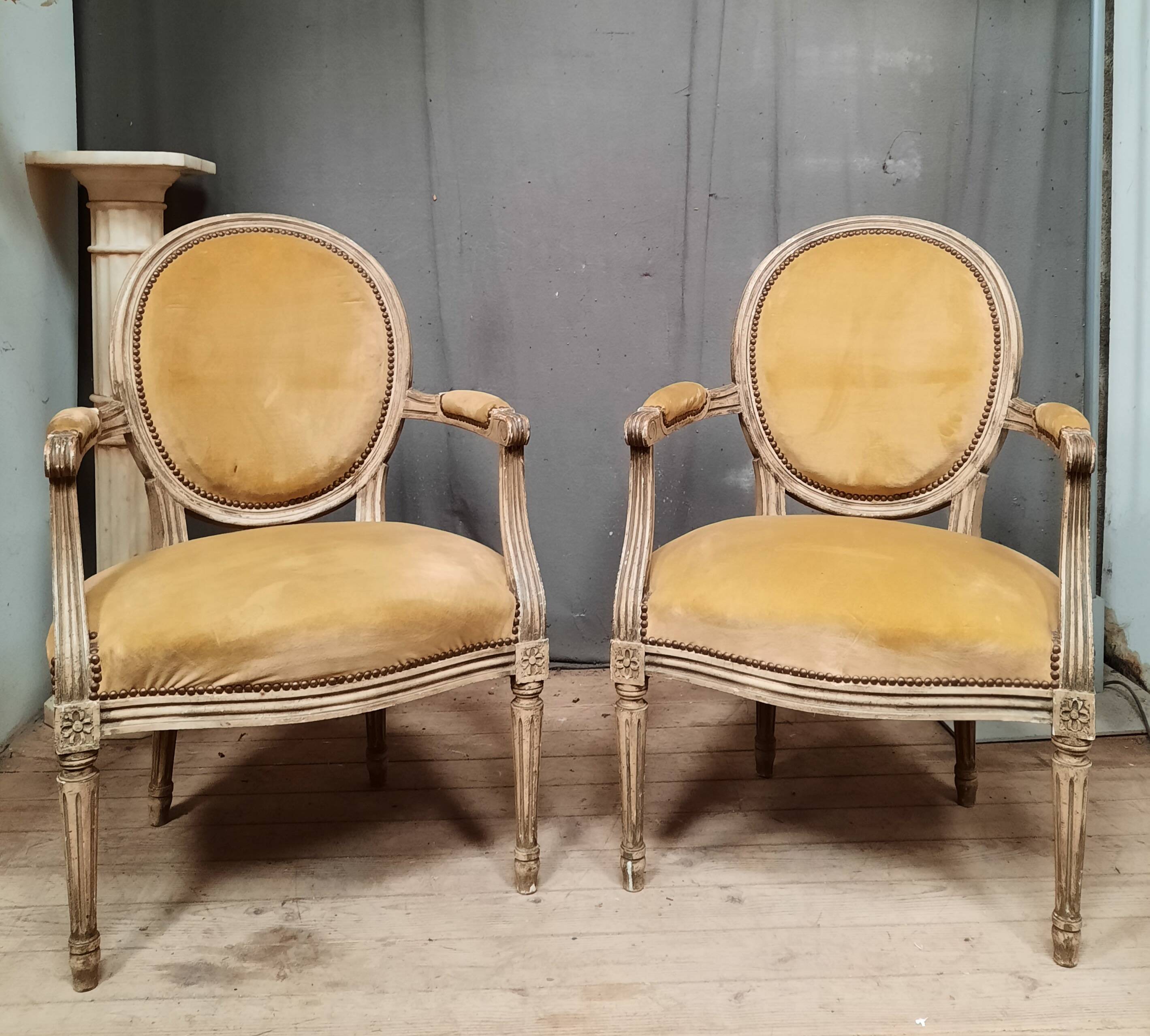 Pair of Louis XVI style medallion armchairs