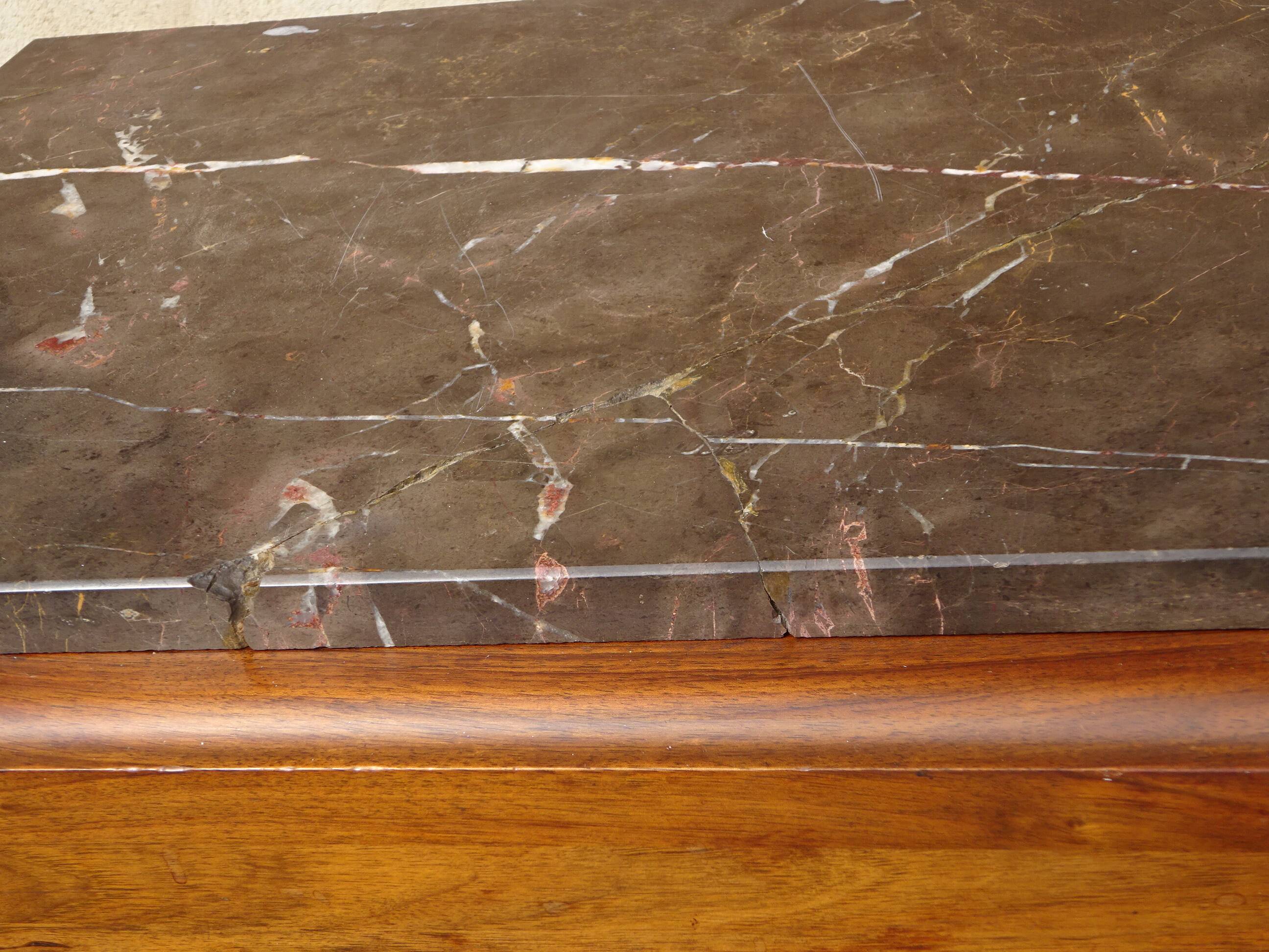Solid walnut sideboard, moustache legs, black marble top.