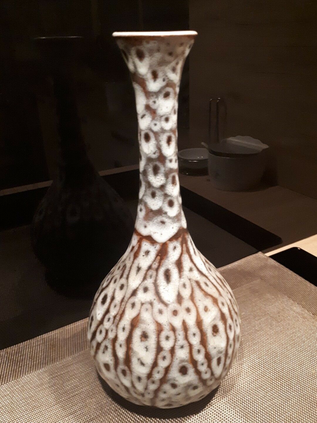Long-necked vase from the 20s and 40s enamelled sandstone artist Tf's signature