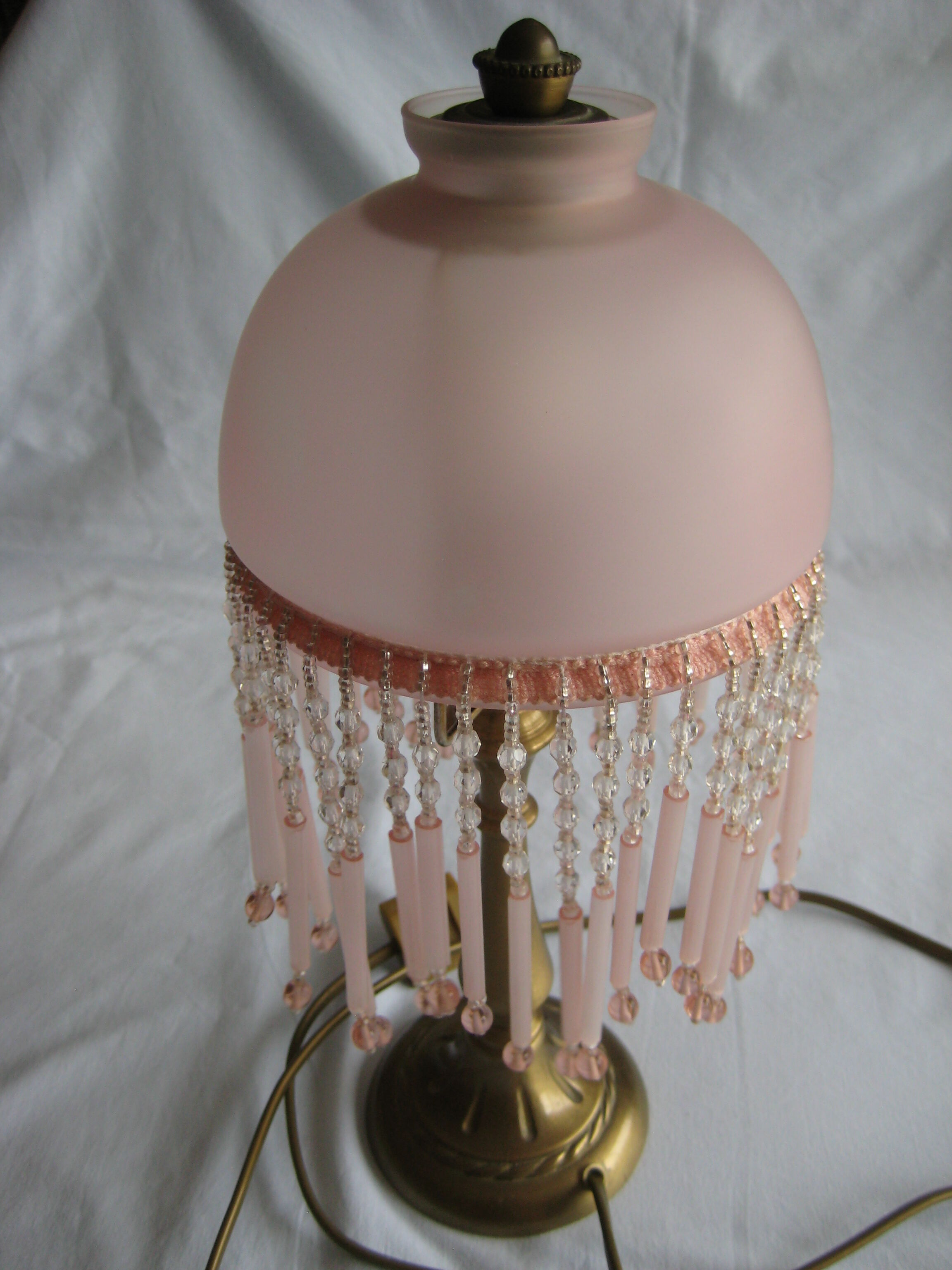Brass bedside lamp with tassel