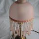 Brass bedside lamp with tassel