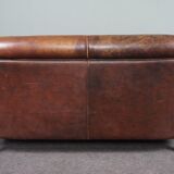 2-seater sofa in sheepskin decorative nails