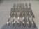 12 fourchettes de table métal argenté orfèvre Christofle Rubans