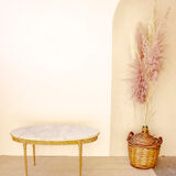 Oval coffee table in marble and brass