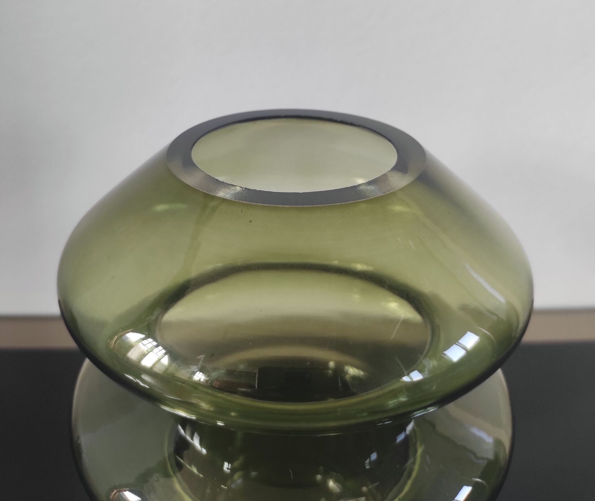 Sculptural vase in olive green glass