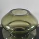Sculptural vase in olive green glass