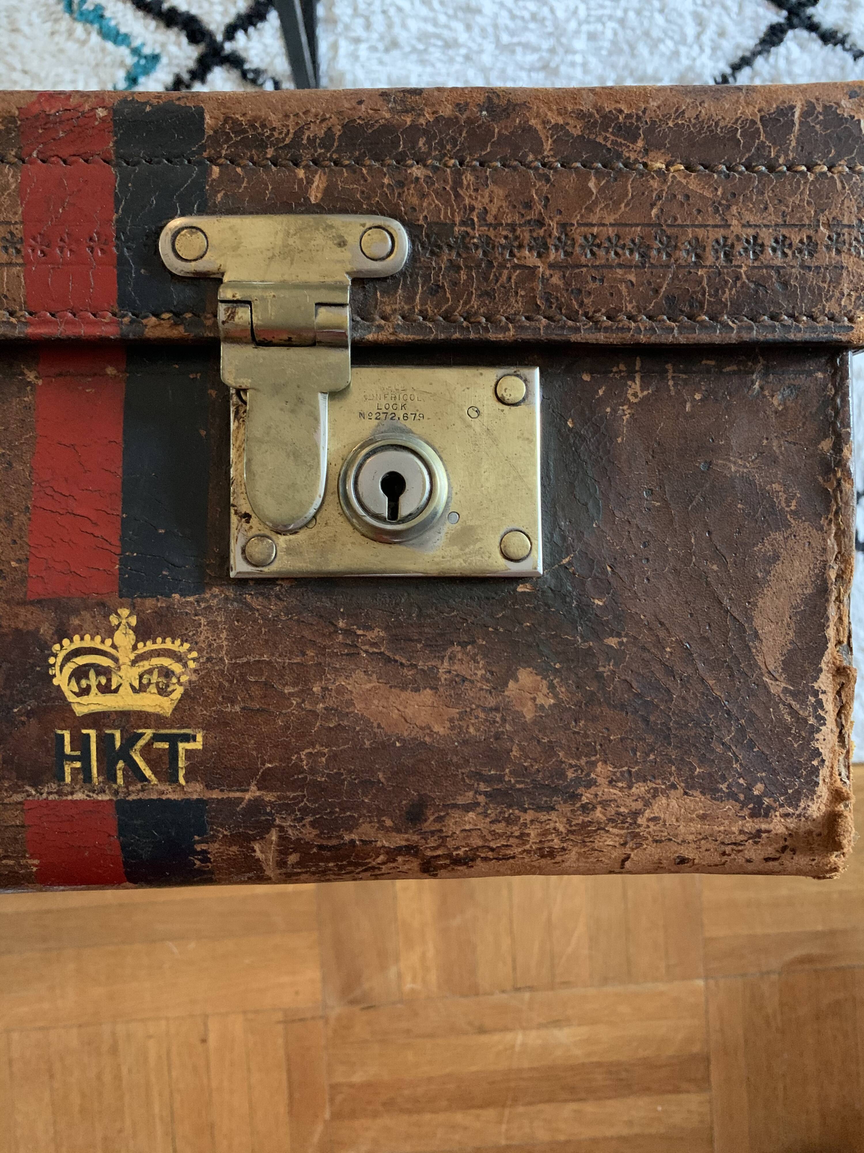 Rare old English suitcase stamped with the royal crown