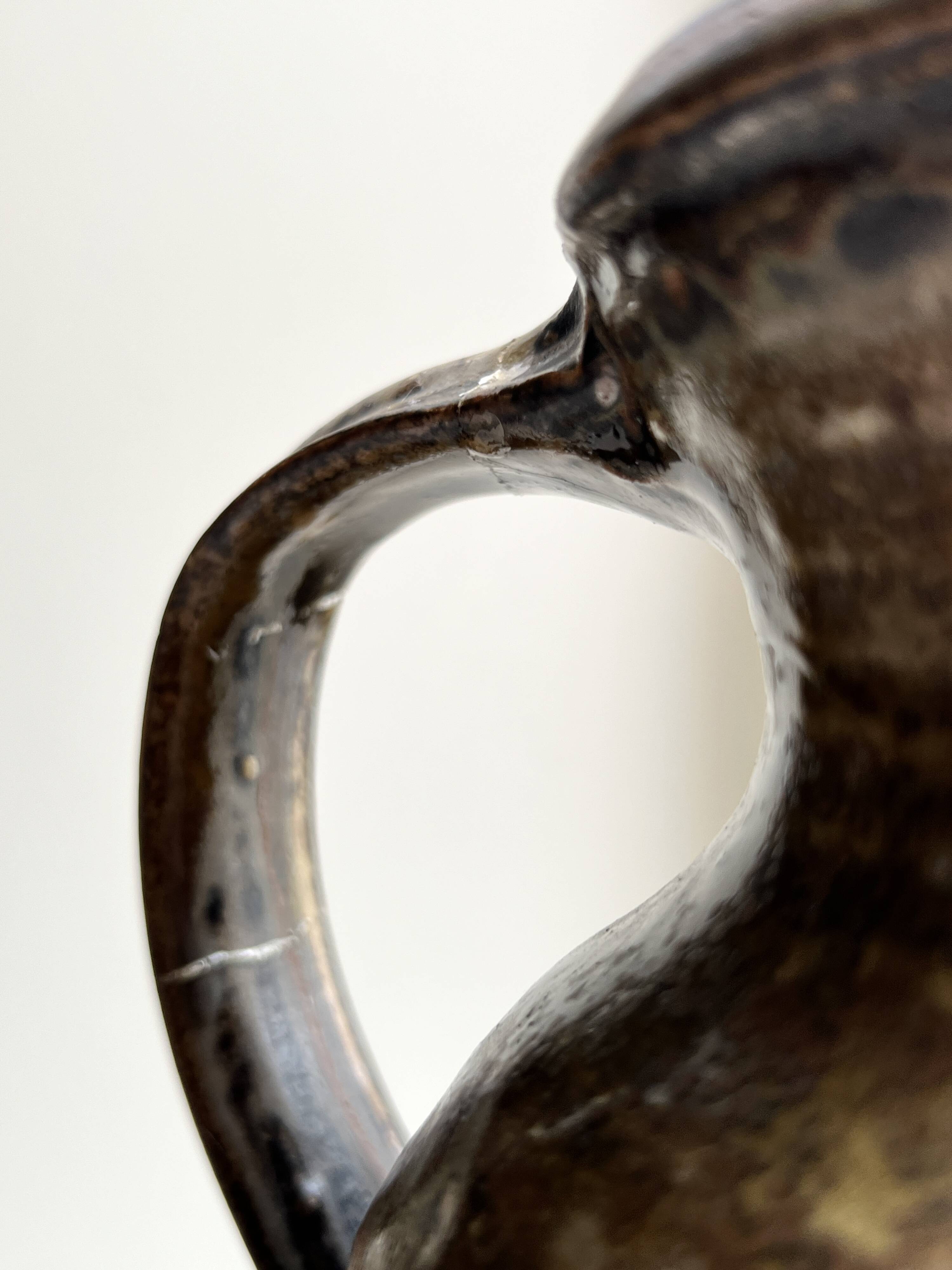 Large brutalist workshop carafe in glazed stoneware, signed, circa 1970.