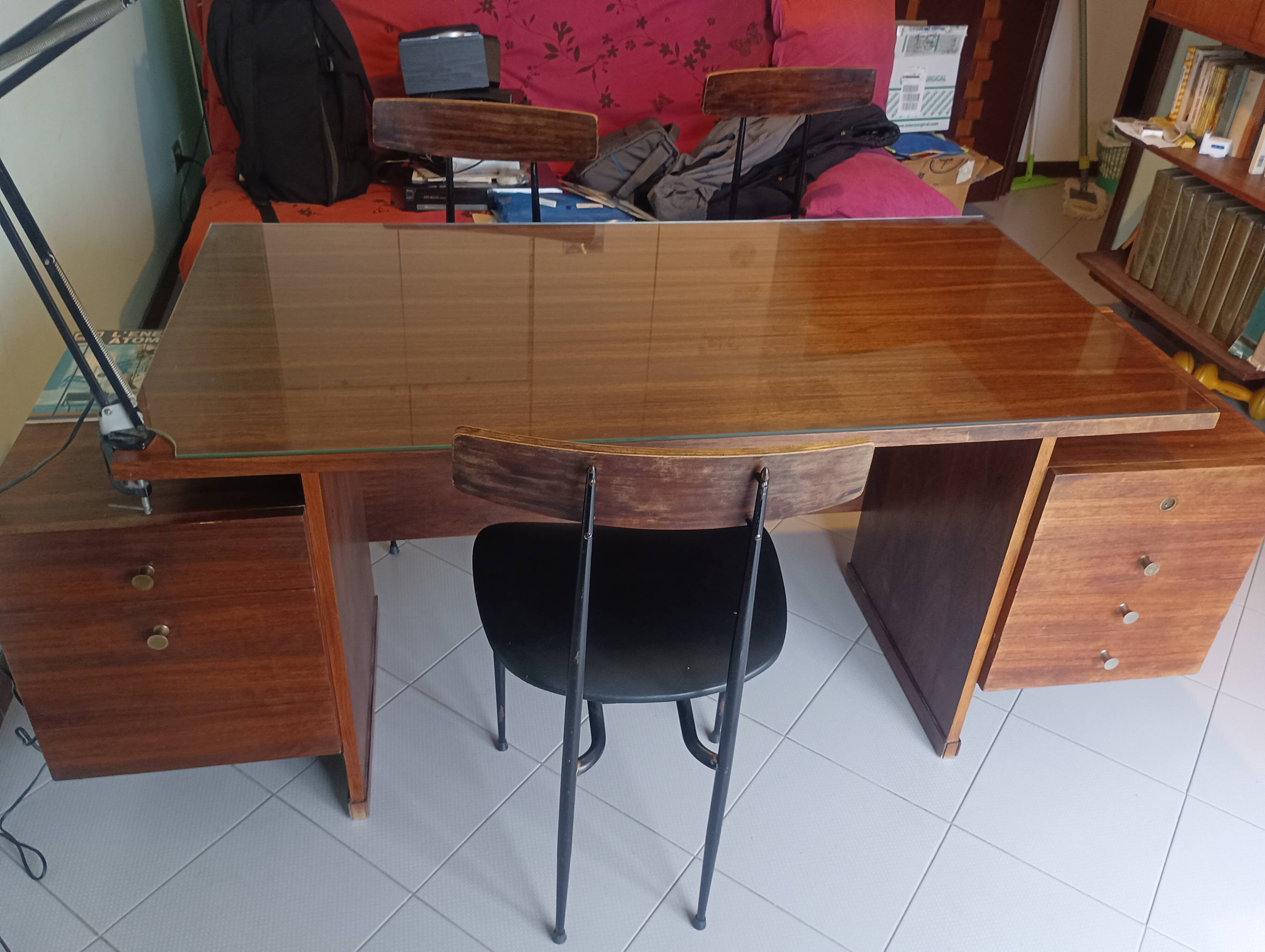 Desk and 3 chairs in 1950s Italian modernist style in rosewood.