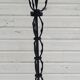 Black wrought iron floor lamp attributed to Gilbert Poillerat