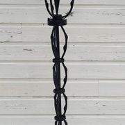 Black wrought iron floor lamp attributed to Gilbert Poillerat