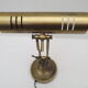 Old aged brass articulated desk lamp