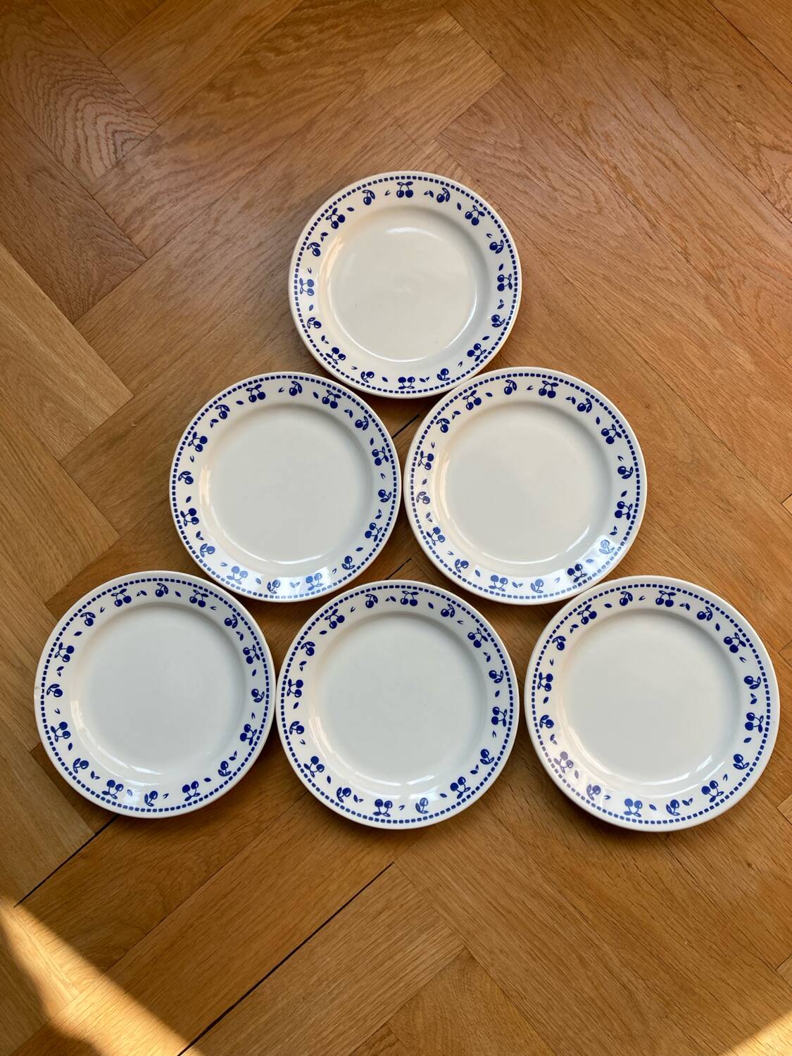 Vintage dessert plates with blue cherry pattern