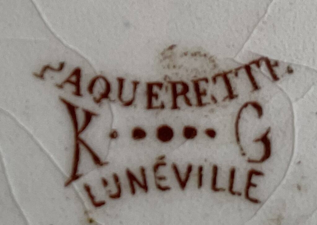 Antique serving dish in Lunéville earthenware.