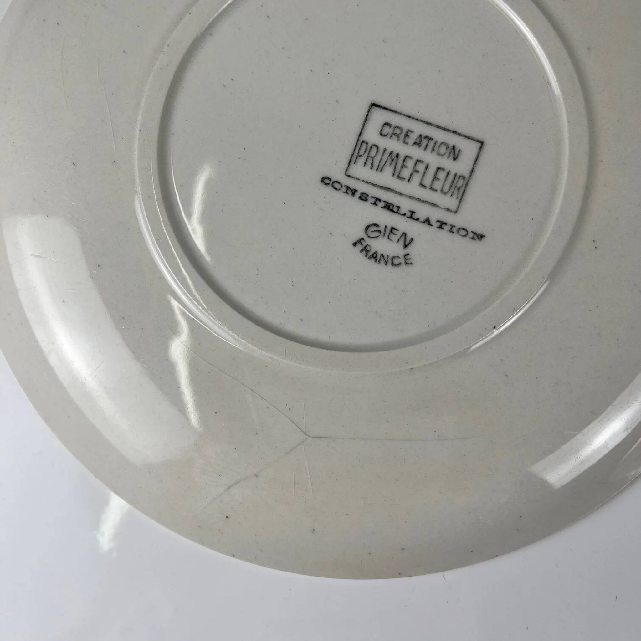 4 assiettes à dessert Gien, création Primefleur, modèle "Constellation", 1950