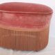 Ottoman, pink velvet footrest with napoleon fringe