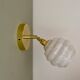 Vintage globe wall lamp in white clichy glass