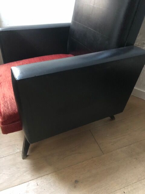 Vintage armchair in red and black skaï