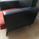 Vintage armchair in red and black skaï
