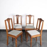 Set of 4 Art Deco chairs in carved wood.