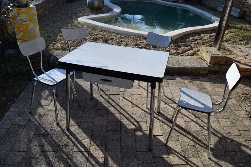Set of table and four chairs formica