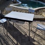 Set of table and four chairs formica