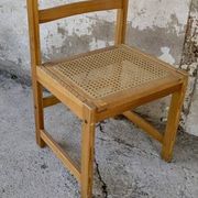 Série de 4 chaises vintage en pin assise cannage