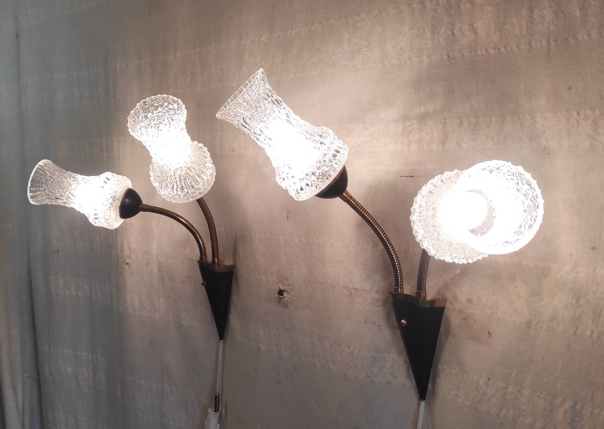 Articulated double light wall sconces in brass and glass - mid 20th century.