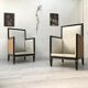 Pair of blackened wood armchairs