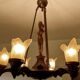 Large Art Deco sculptural chandelier in bronze and glass, 1930s