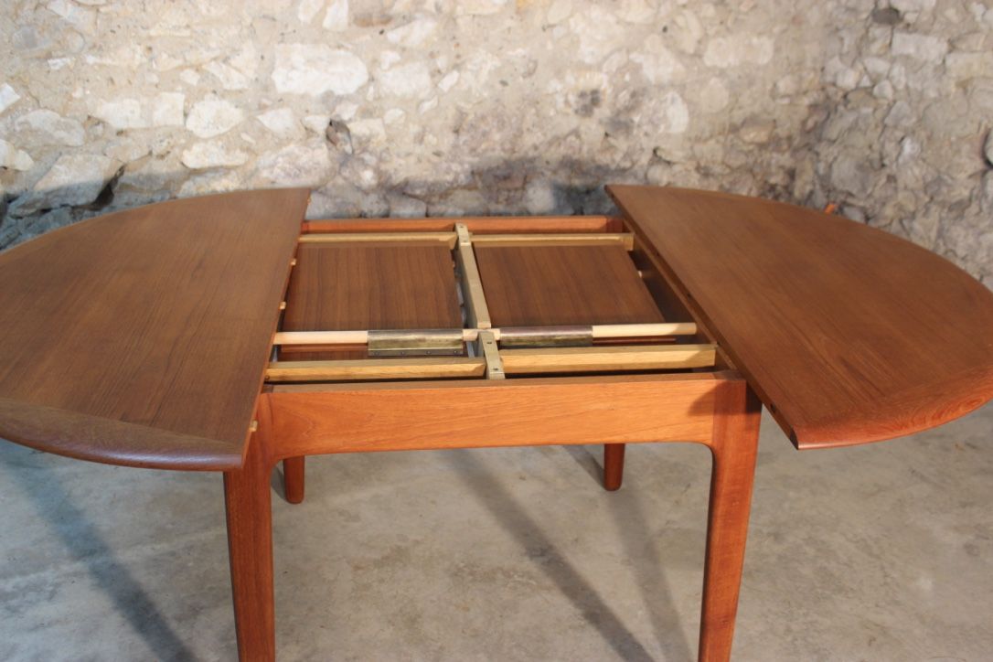 Scandinavian vintage teak dining table with 2 extension cords hidden by Svend Aage Madsen for Knudsen - Son, Denmark