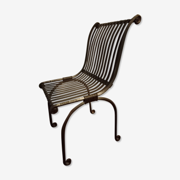 Very elegant wrought iron armchair