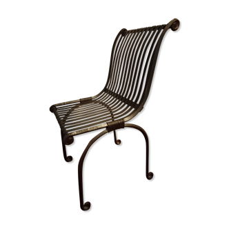 Very elegant wrought iron armchair