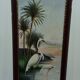 Pair of oil paintings on canvas depicting tropical birds.