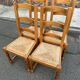 4 solid wood straw-seated chairs, oak, 20th century, 105cm