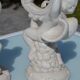 Pair of "cherub" candle holders in plaster