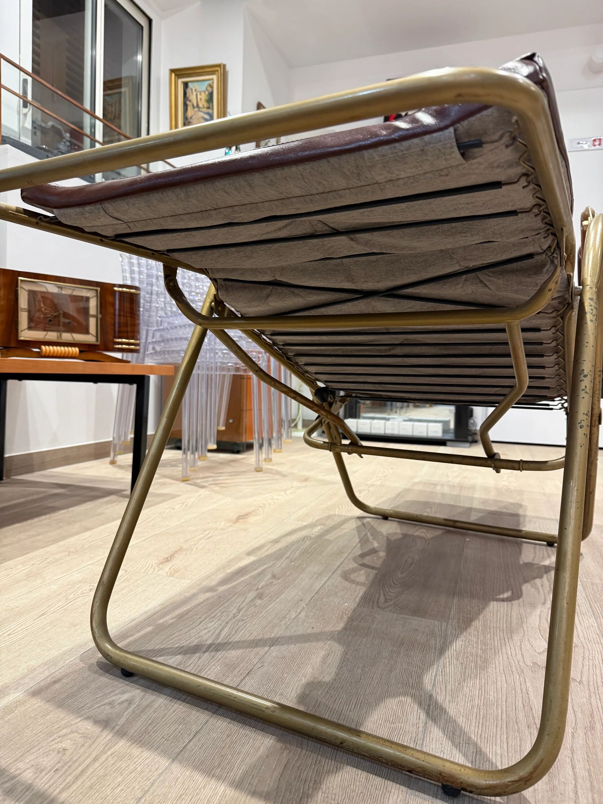 Reclining armchair in brown leather with tubular frame – Italy – 1960s/1970s