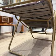Reclining armchair in brown leather with tubular frame – Italy – 1960s/1970s