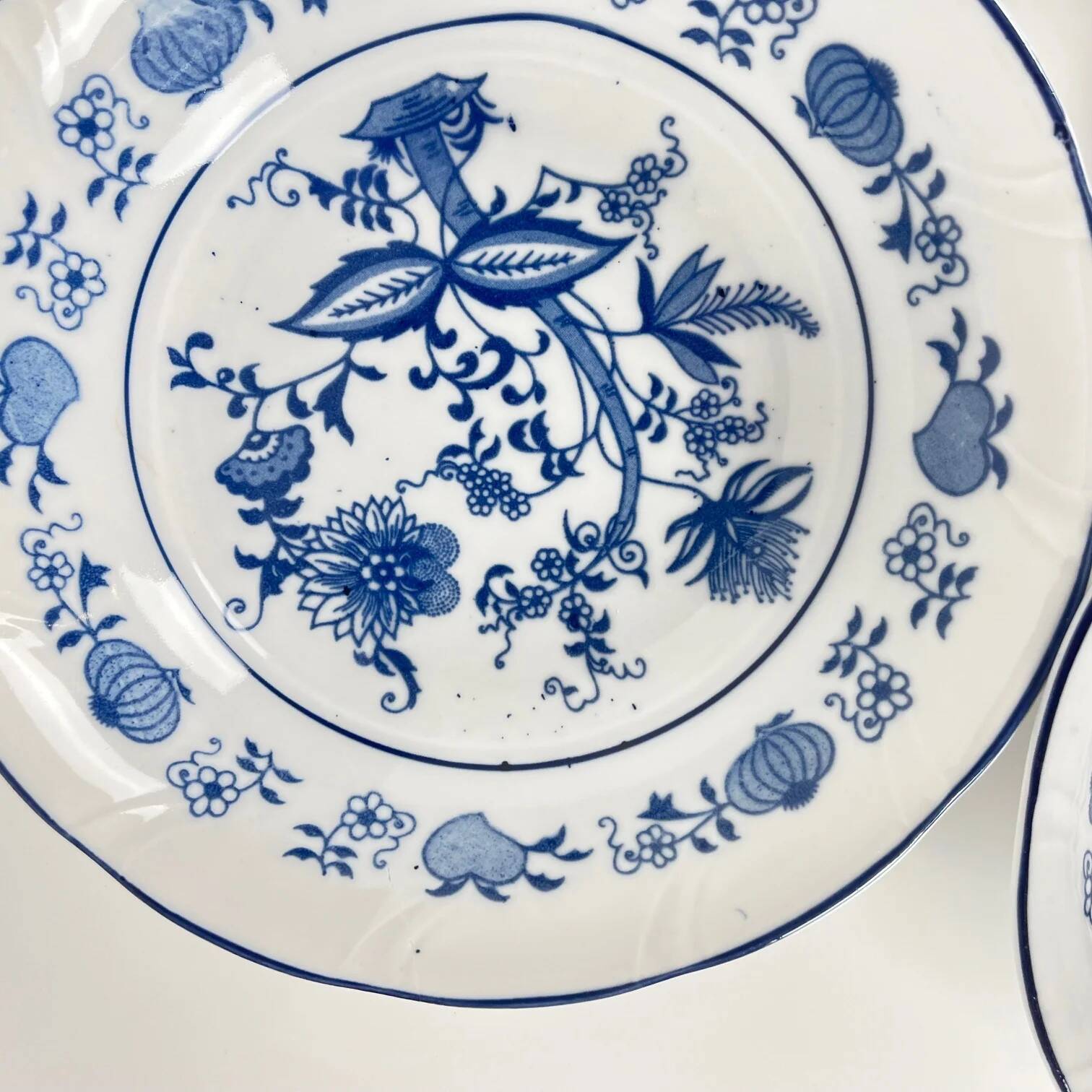 4 bowls / small dishes with blue onion pattern