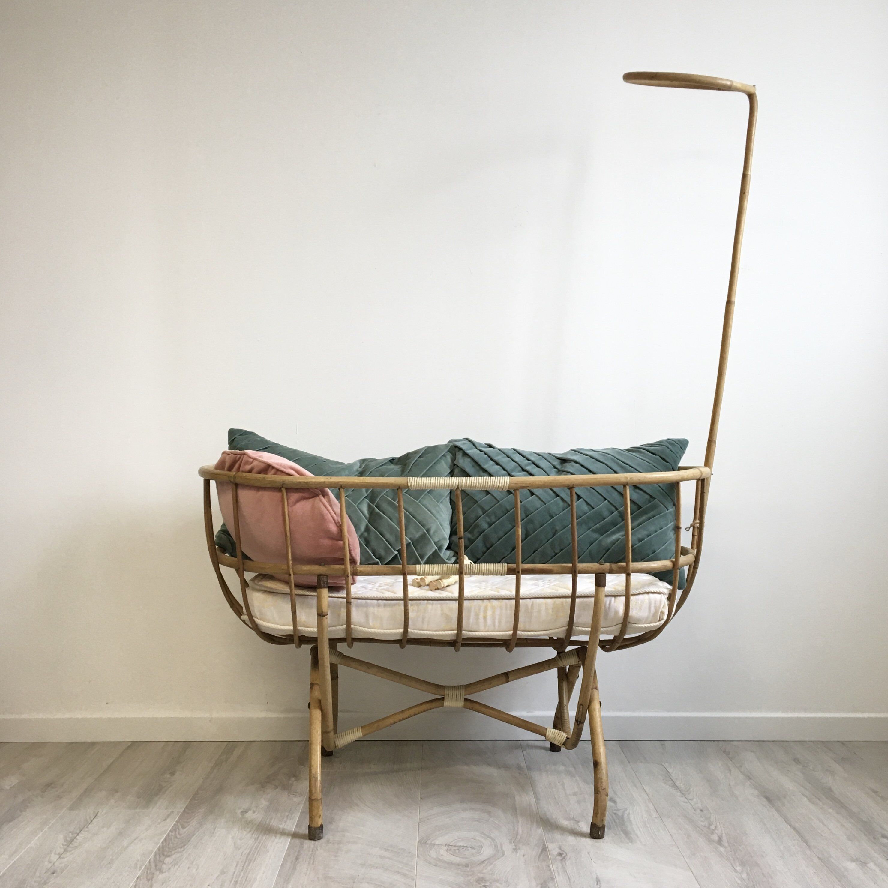 Vintage rattan cradle