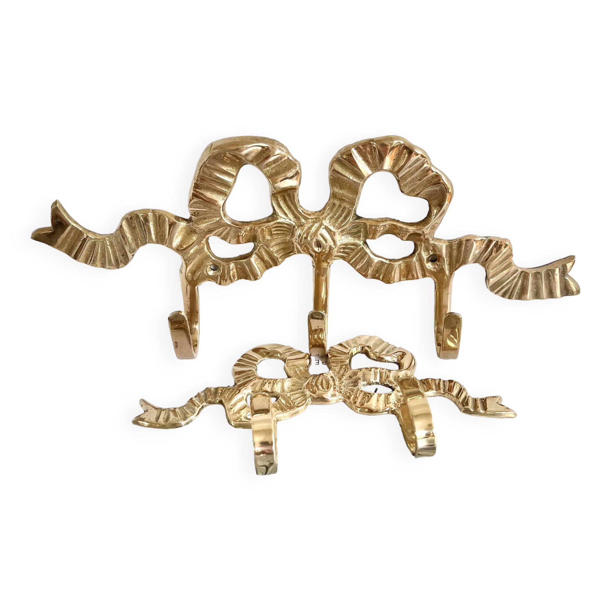 2 hooks in gilded brass