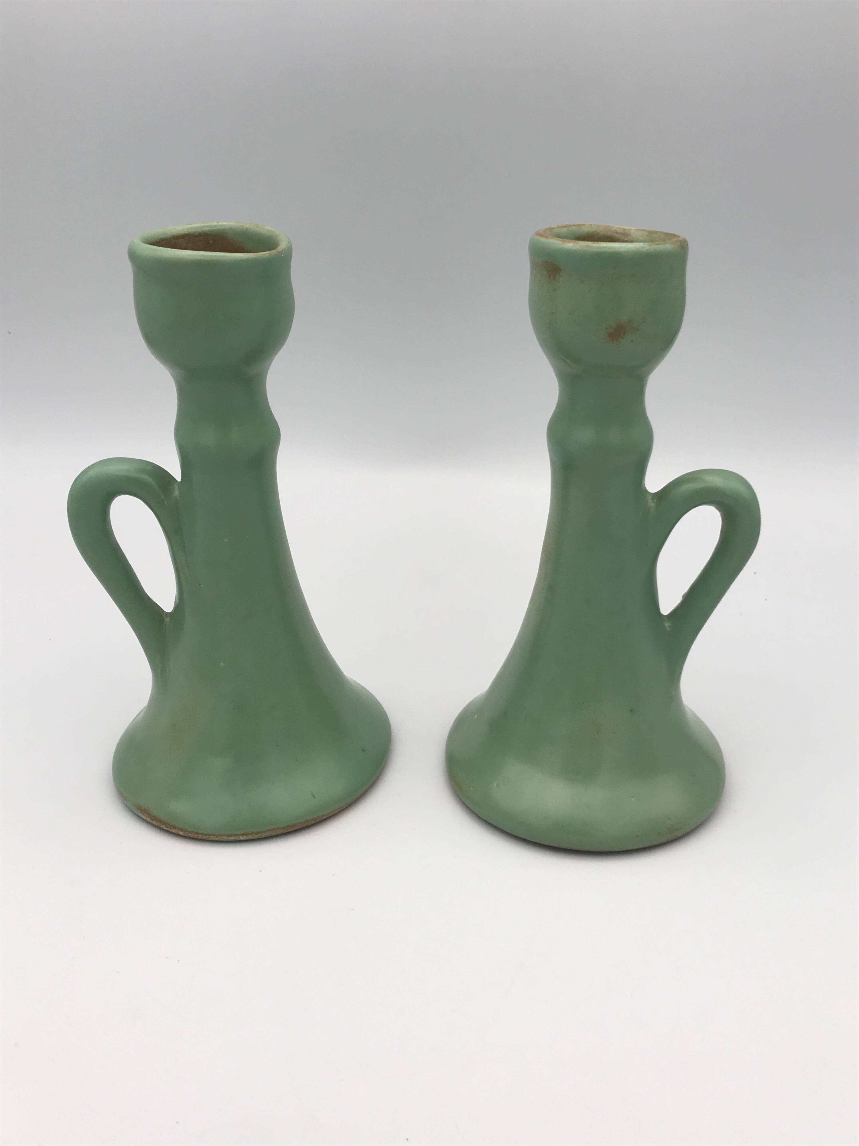 Pair of vintage table candle holders in green enameled ceramic